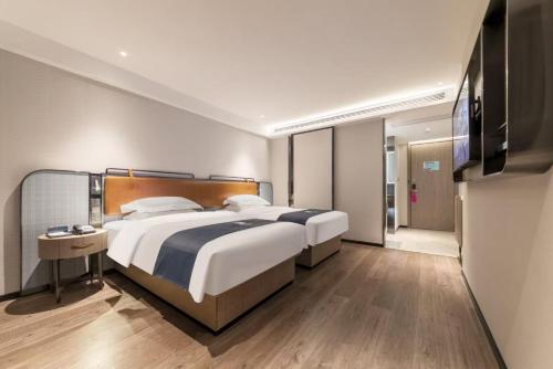 Imagen general del Hotel Eharm Wuhan Optics Valley University Park Road. Foto 5