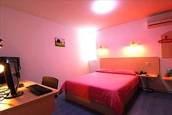 Imagen de la habitación del Hotel Ehominns Caifu Square - Hefei. Foto 10