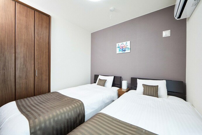 Imagen de la habitación del Hotel E-horizon Resort Condominium Nago D. Foto 16