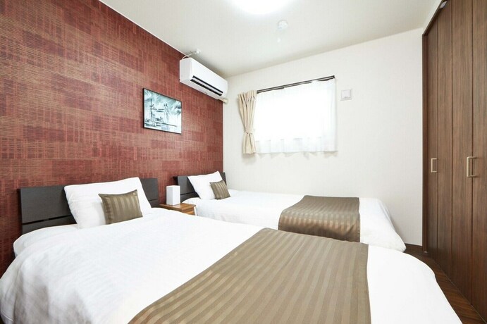 Imagen de la habitación del Hotel E-horizon Resort Condominium Nago D. Foto 17