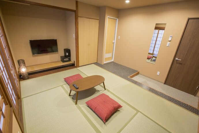 Imagen de la habitación del Hotel E-hostel Shinsaibashi. Foto 3