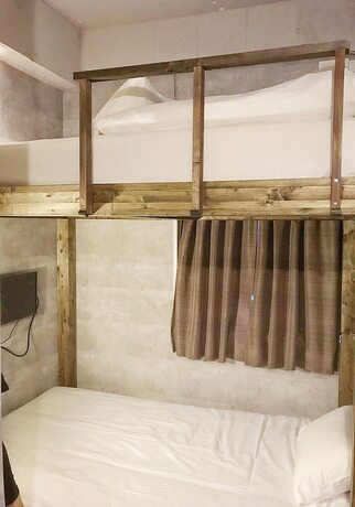 Imagen de la habitación del Hotel E-hostel Shinsaibashi. Foto 7