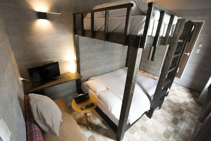 Imagen de la habitación del Hotel E-hostel Shinsaibashi. Foto 10