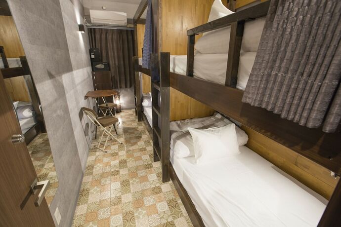 Imagen de la habitación del Hotel E-hostel Shinsaibashi. Foto 16