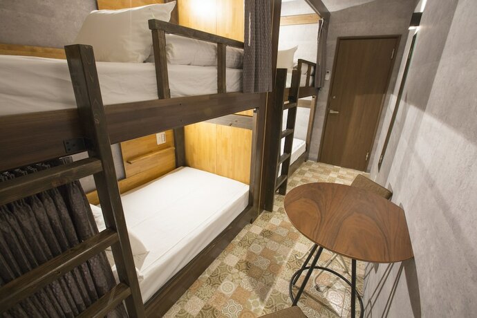 Imagen de la habitación del Hotel E-hostel Shinsaibashi. Foto 17