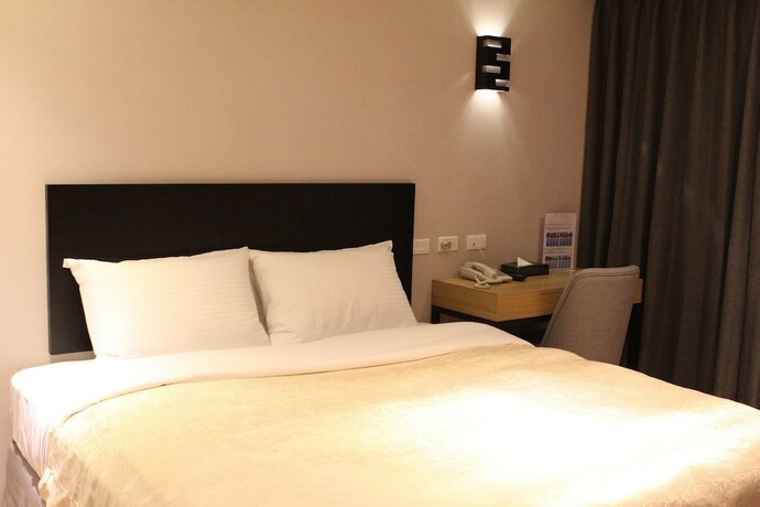 Imagen de la habitación del Hotel E-house. Foto 18
