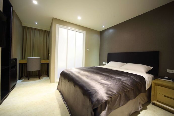 Imagen de la habitación del Hotel E-house. Foto 19