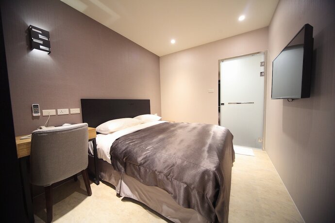 Imagen de la habitación del Hotel E-house. Foto 20