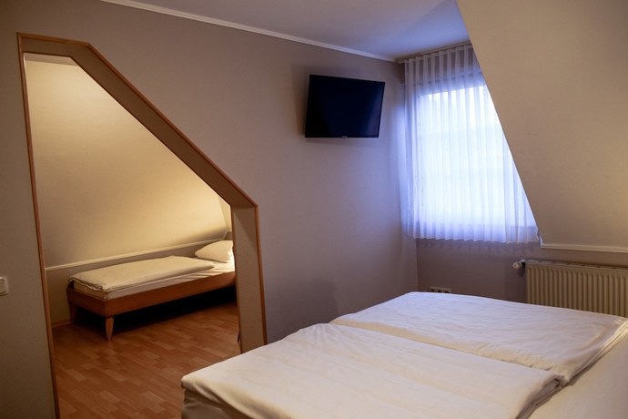 Imagen de la habitación del Hotel Eifelhotel Im Fronhof. Foto 11