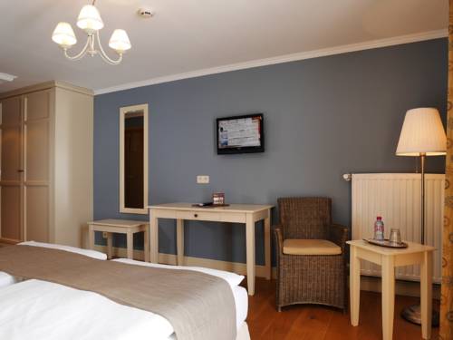 Imagen de la habitación del Hotel Eifelland. Foto 14