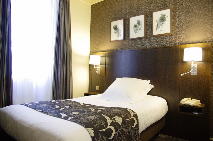 Imagen de la habitación del Hotel Eiffel Saint Charles. Foto 6