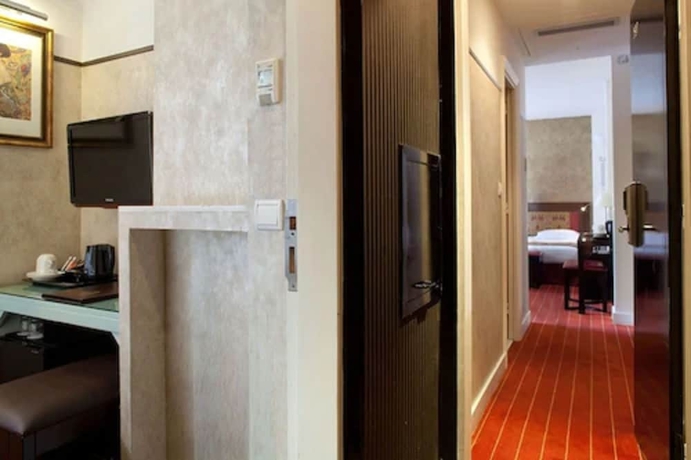 Imagen de la habitación del Hotel Eiffel Seine. Foto 15