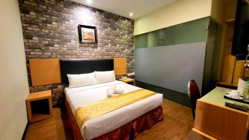 Imagen de la habitación del Hotel Eight Days Boutique - Permas Jaya. Foto 12