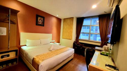 Imagen de la habitación del Hotel Eight Days Boutique - Permas Jaya. Foto 13