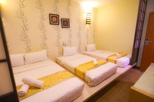 Imagen de la habitación del Hotel Eight Days Boutique - Permas Jaya. Foto 16