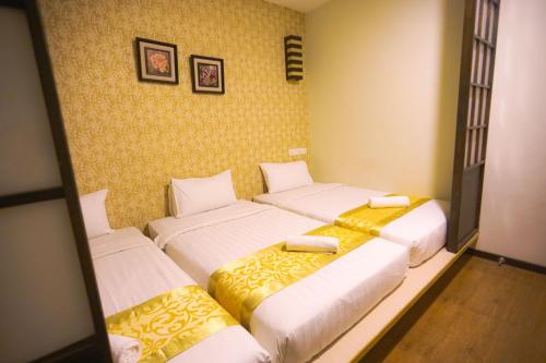 Imagen de la habitación del Hotel Eight Days Boutique - Permas Jaya. Foto 17