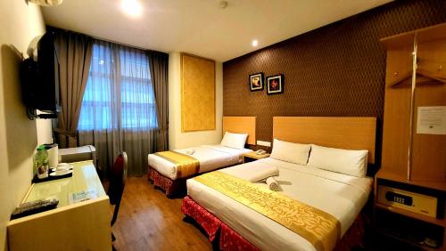 Imagen de la habitación del Hotel Eight Days Boutique - Permas Jaya. Foto 18