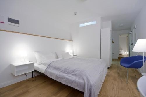 Imagen de la habitación del Hotel Einzigartig - Das Kleine Im Wasserviertel. Foto 8
