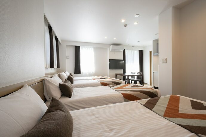 Imagen de la habitación del Hotel Eisei Stay. Foto 12