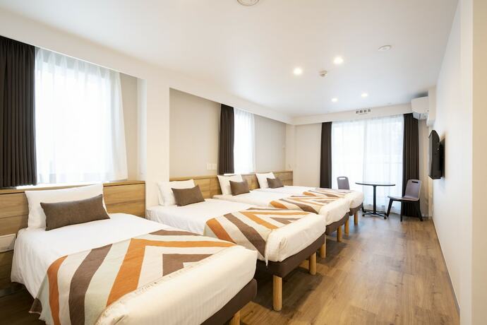 Imagen de la habitación del Hotel Eisei Stay. Foto 13