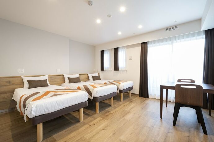 Imagen de la habitación del Hotel Eisei Stay. Foto 14