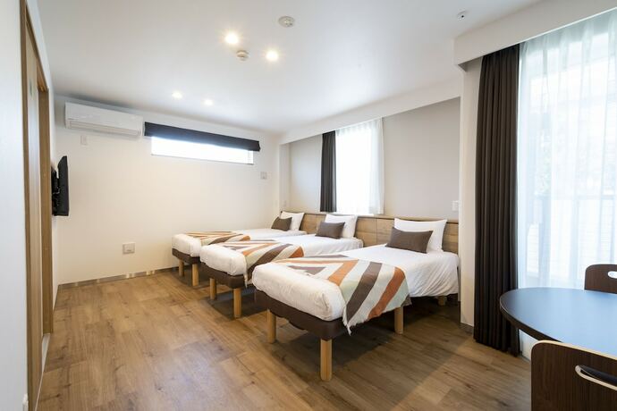 Imagen de la habitación del Hotel Eisei Stay. Foto 15