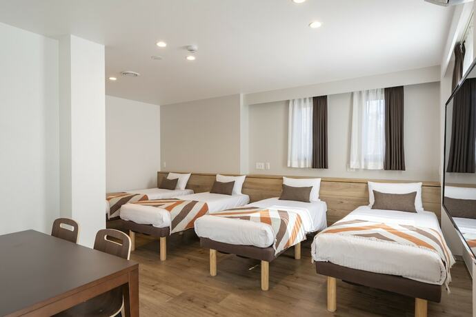 Imagen de la habitación del Hotel Eisei Stay. Foto 17