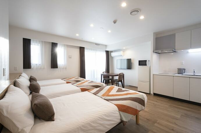 Imagen de la habitación del Hotel Eisei Stay. Foto 18