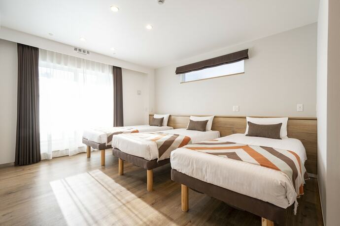 Imagen de la habitación del Hotel Eisei Stay. Foto 19