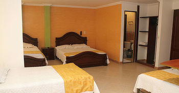 Imagen de la habitación del Hotel Ejecutivo 63 In. Foto 2