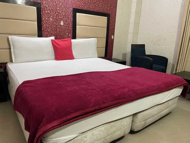 Imagen de la habitación del Hotel Ek Noor Residency. Foto 9