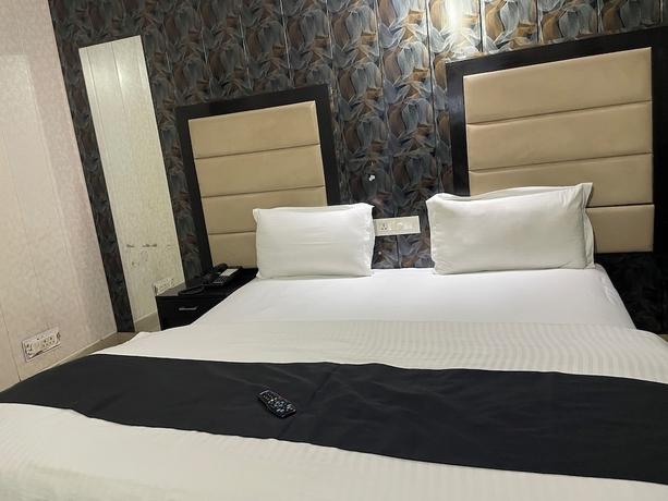 Imagen de la habitación del Hotel Ek Noor Residency. Foto 15