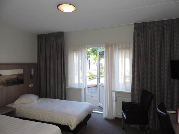 Imagen de la habitación del Hotel Ekamper. Foto 18