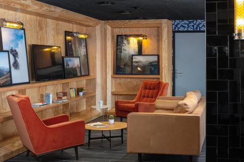 Imagen de los interiores del Hotel Eklo Hotels Toulouse Cartoucherie Zenith. Foto 8