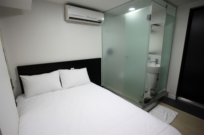 Imagen de la habitación del Hotel Ekonomy Myeongdong Premier. Foto 2