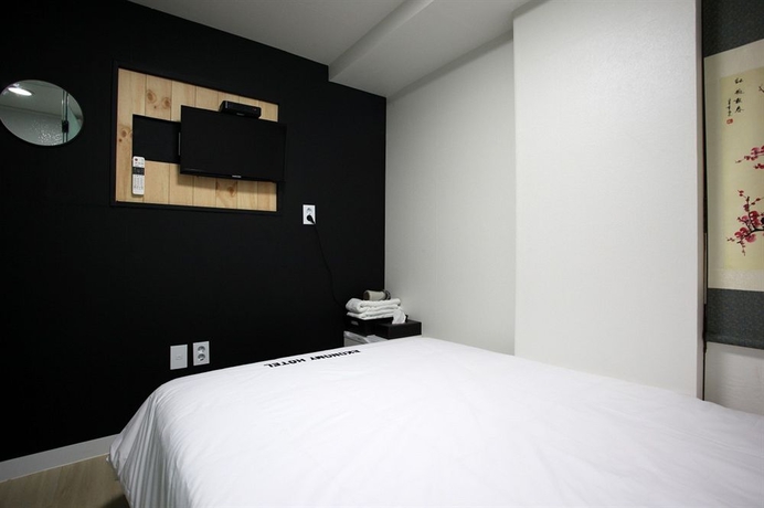 Imagen de la habitación del Hotel Ekonomy Myeongdong Premier. Foto 3