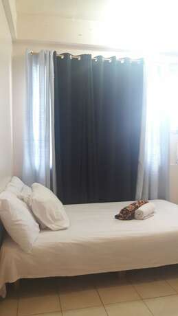 Imagen de la habitación del Hotel Ekonumi Rooms At Benrosi Plaza. Foto 14