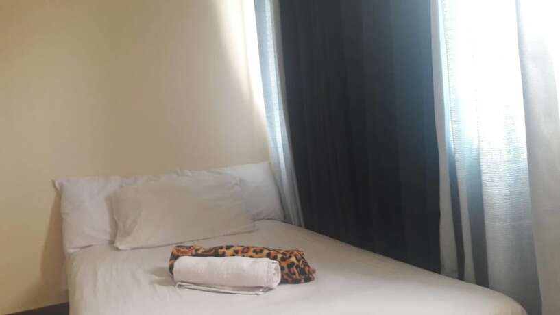 Imagen de la habitación del Hotel Ekonumi Rooms At Benrosi Plaza. Foto 16