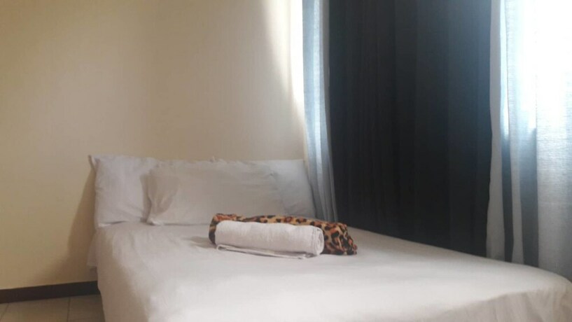 Imagen de la habitación del Hotel Ekonumi Rooms At Benrosi Plaza. Foto 20