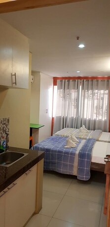 Imagen de la habitación del Hotel El Agapanthus Hotel. Foto 22
