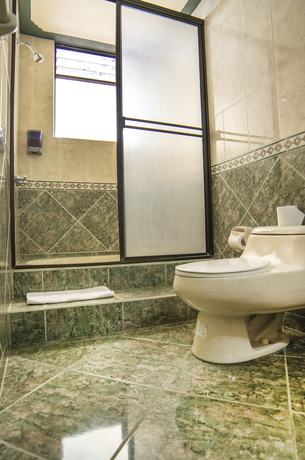 Imagen de la habitación del Hotel El Auca. Foto 10