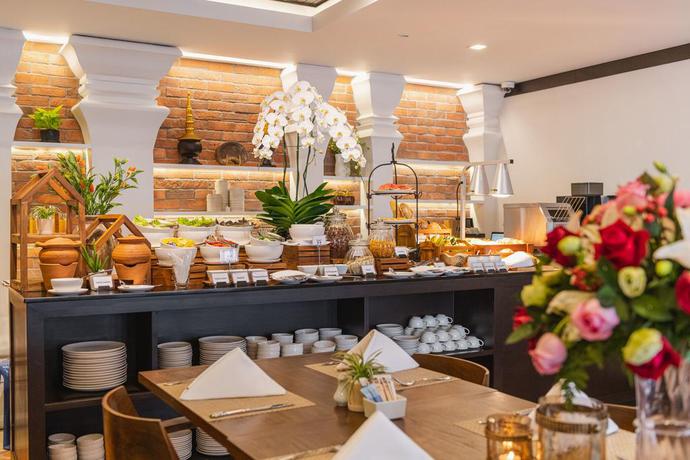 Imagen del bar/restaurante del Hotel El Barrio Lanna. Foto 7