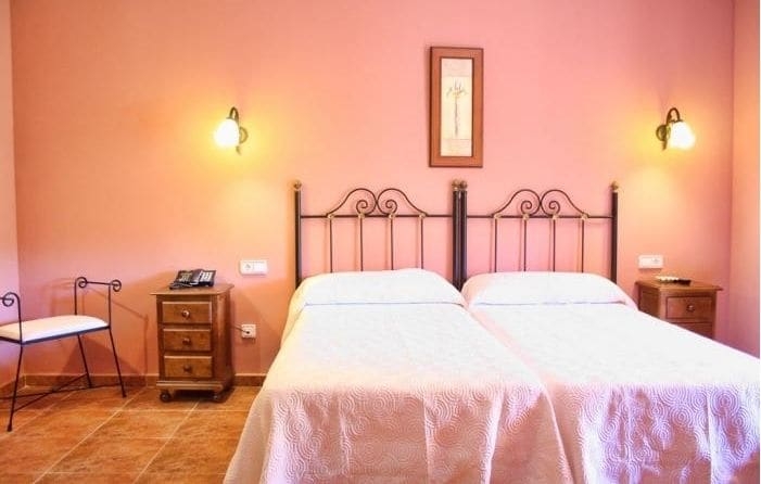 Imagen de la habitación del Hotel El Borbotón. Foto 10