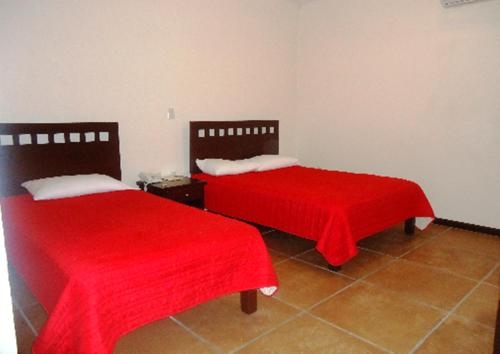 Imagen de la habitación del Hotel El Cafetalero. Foto 4
