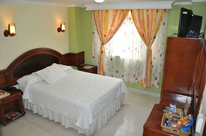 Imagen de la habitación del Hotel El Caimito. Foto 13