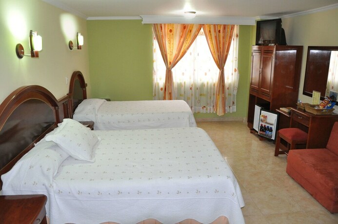 Imagen de la habitación del Hotel El Caimito. Foto 16