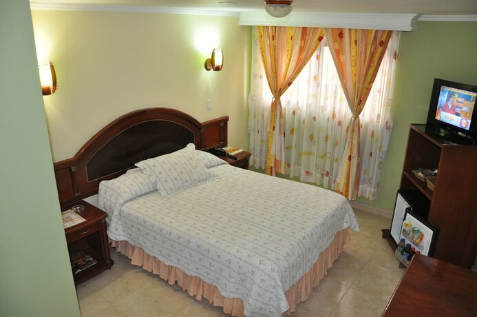Imagen de la habitación del Hotel El Caimito. Foto 18