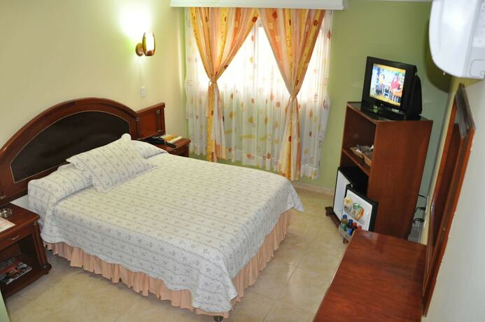 Imagen de la habitación del Hotel El Caimito. Foto 19