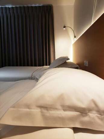 Imagen de la habitación del Hotel El Carmelo. Foto 14