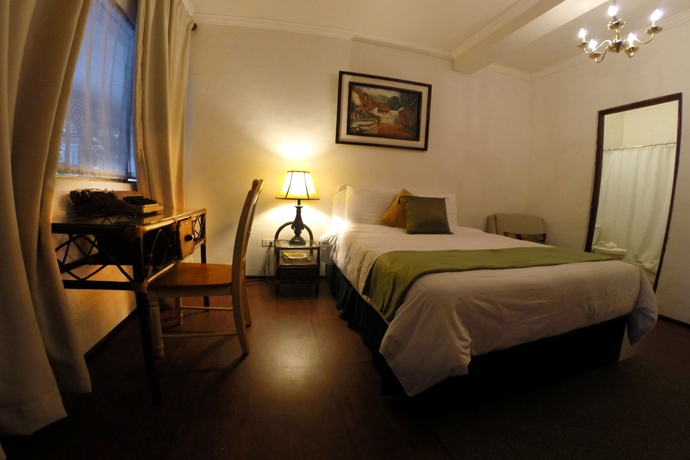 Imagen de la habitación del Hotel El Carmen, Antigua Guatemala. Foto 13